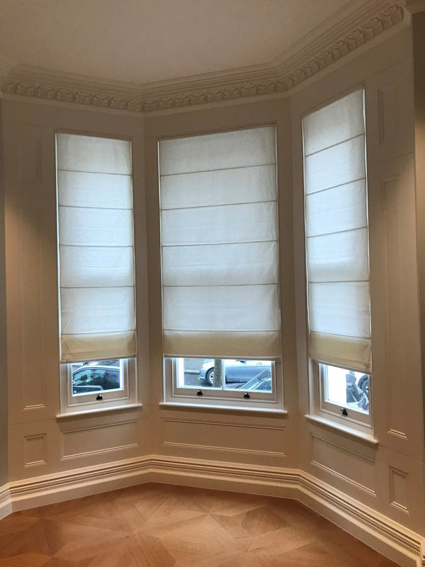 bay window with roman blinds